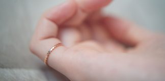Women wearing rings on pinky fingers: What does it mean?